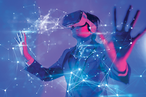 Person using VR headshot with the hands up. Purple, blue, and pink futuristic background.