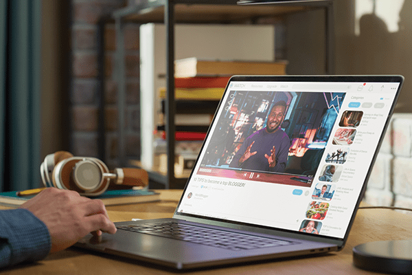 Person using YouTube on laptop.
